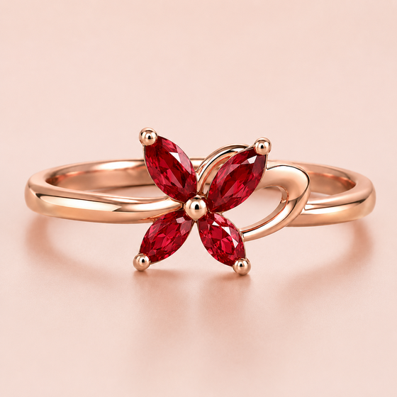 Bague papillon sertie de pierres rouges