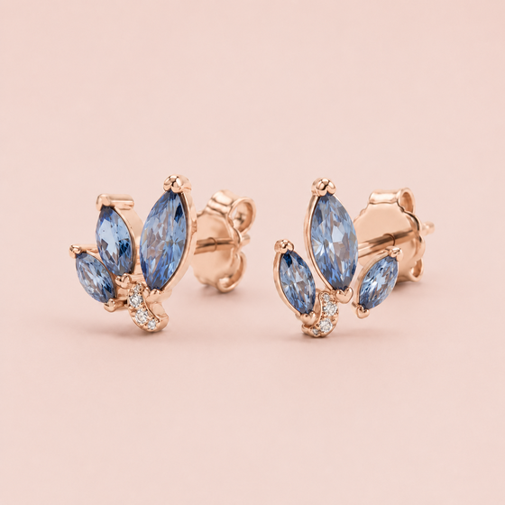 Puces d'oreilles serties de pierres bleues